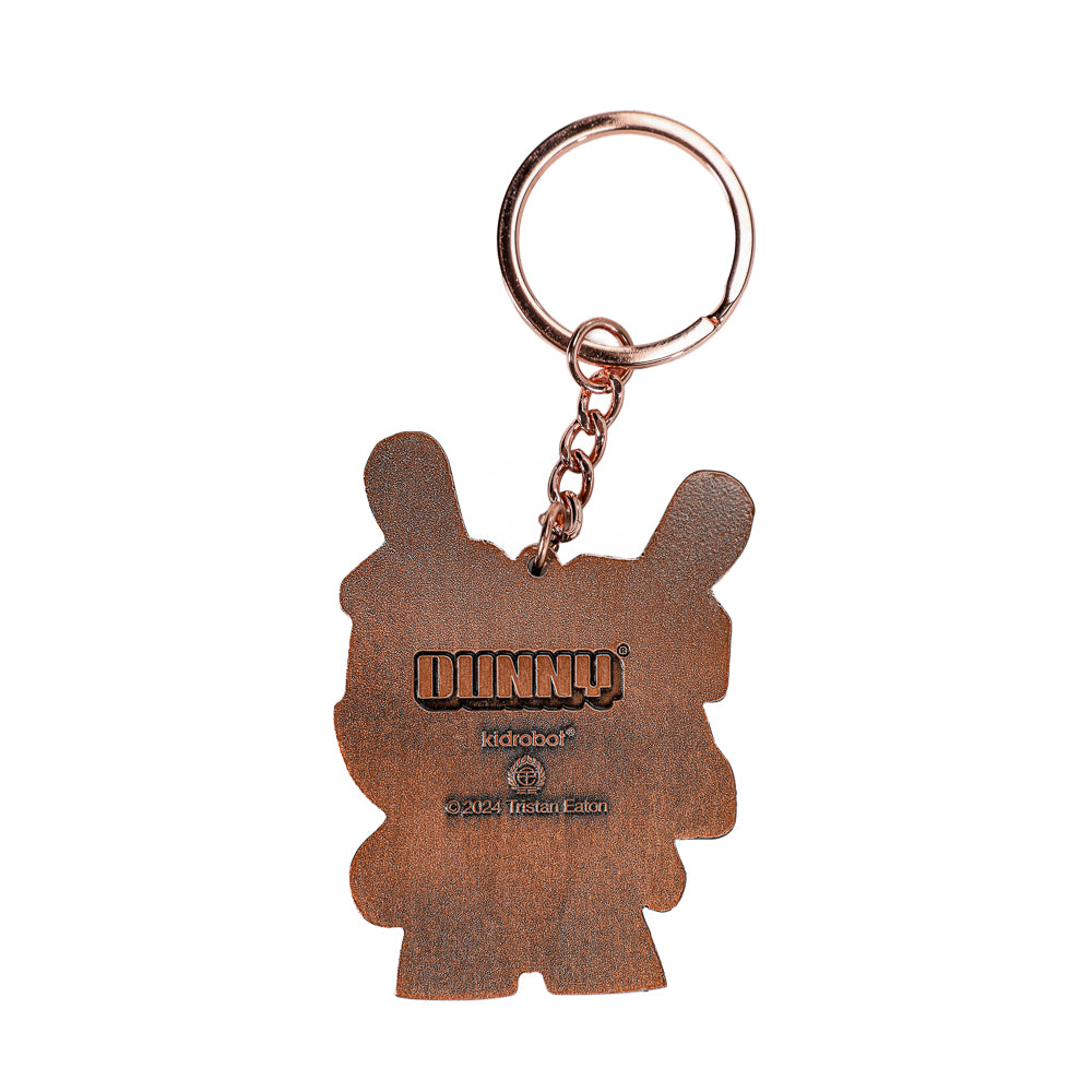 Solid metal Dunny keychain in Copperchrome finish by Tristan Eaton, 20th Anniversary limited edition, featuring detailed design and branding.