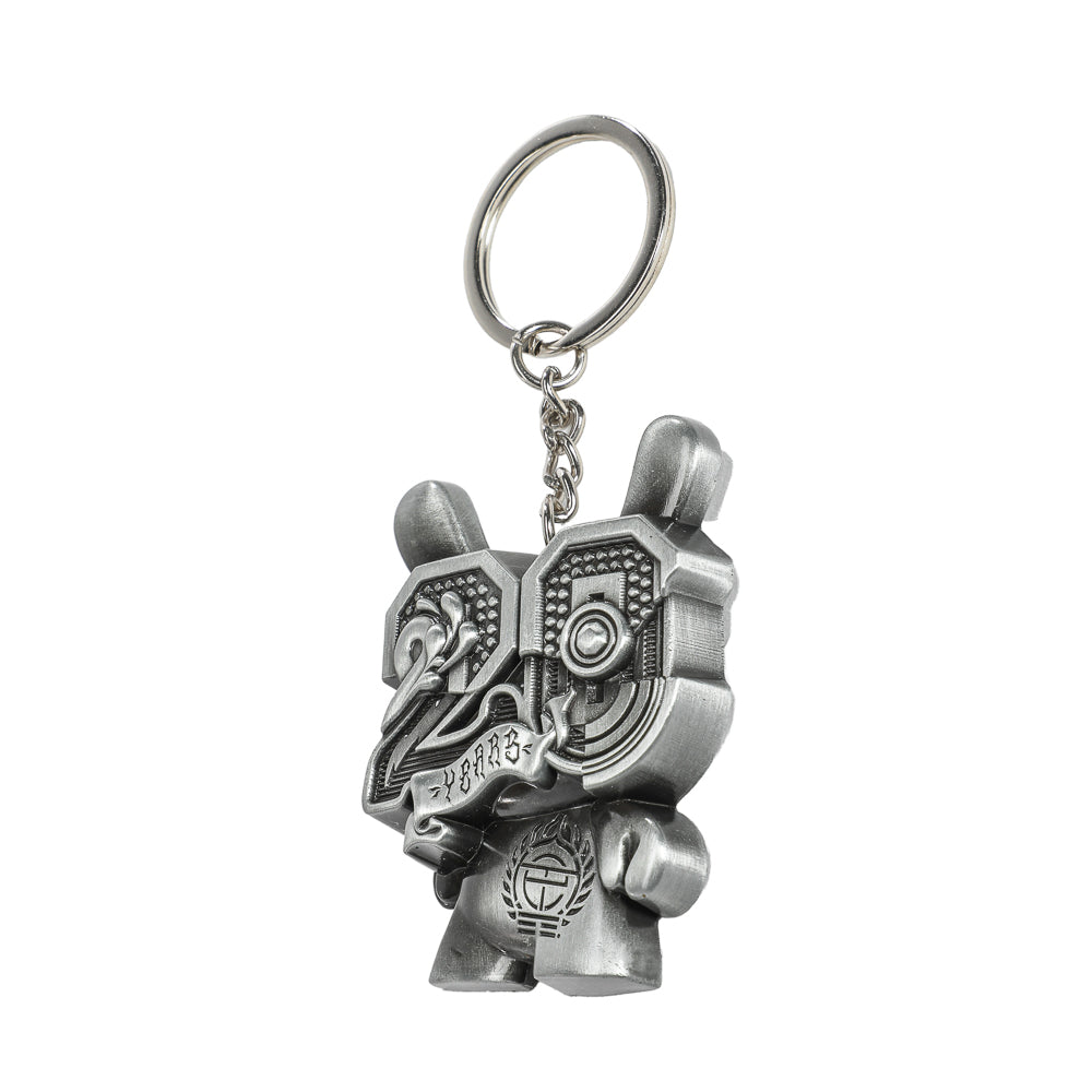 20th Anniversary solid metal Dunny keychain in Silverchrome by Tristan Eaton, limited edition of 200, featuring detailed design.