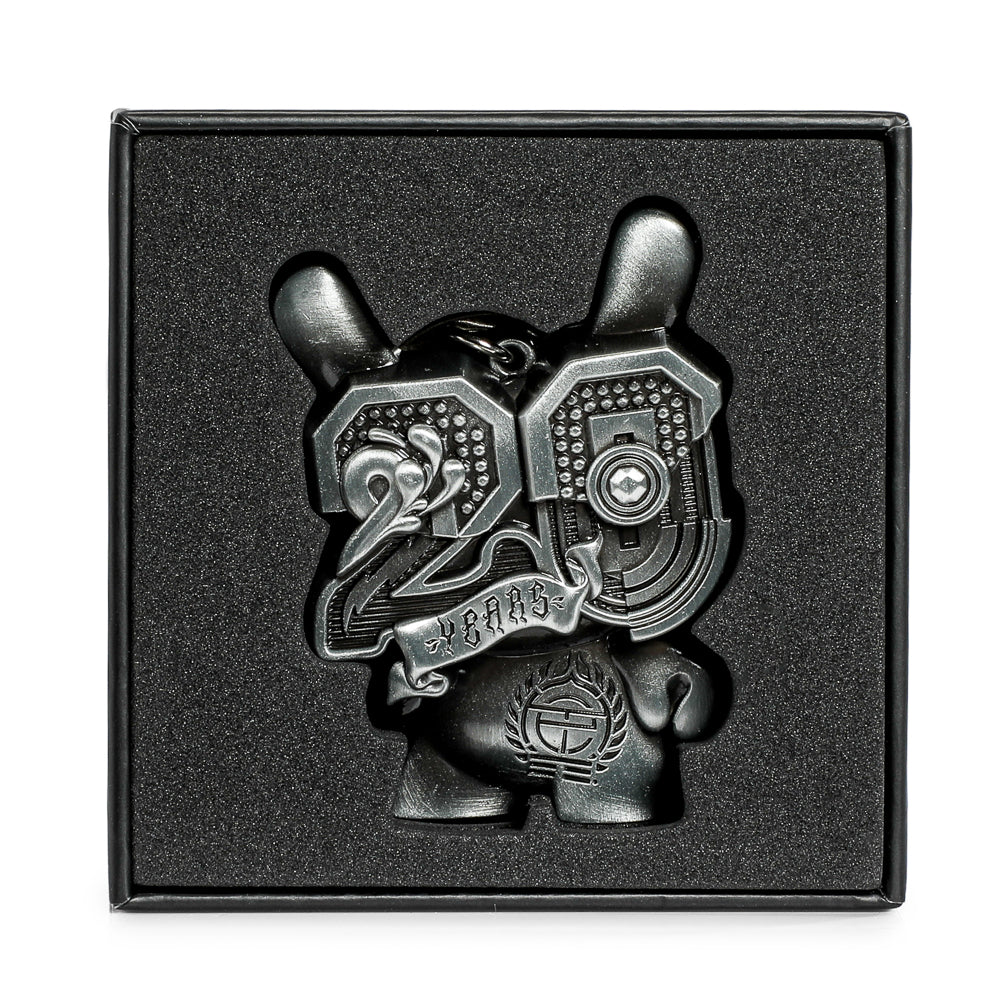 20th Anniversary Solid Metal Dunny Keychain in Silverchrome by Tristan Eaton, limited edition of 200, featuring detailed sculptural design.