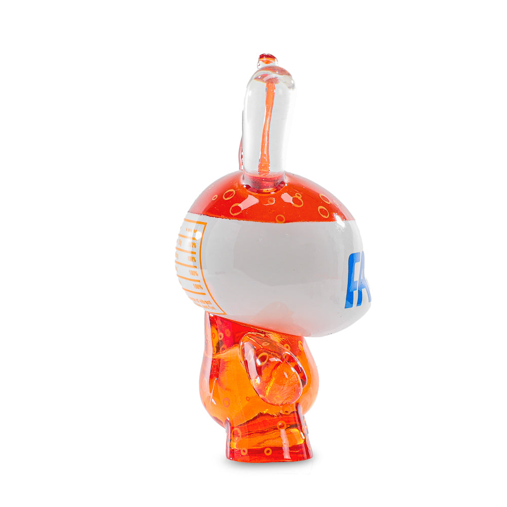 3-inch Fanta Orange resin Dunny art figure by Kidrobot and Coca-Cola, featuring bright orange color and detailed design.