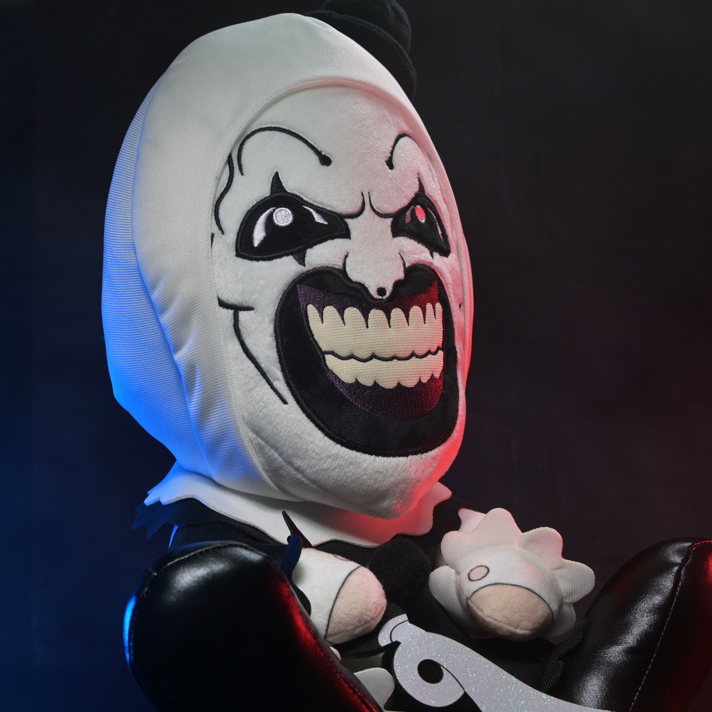 Large Art the Clown plush from Terrifier 3 featuring detailed horror character design and soft, cuddly fabric.