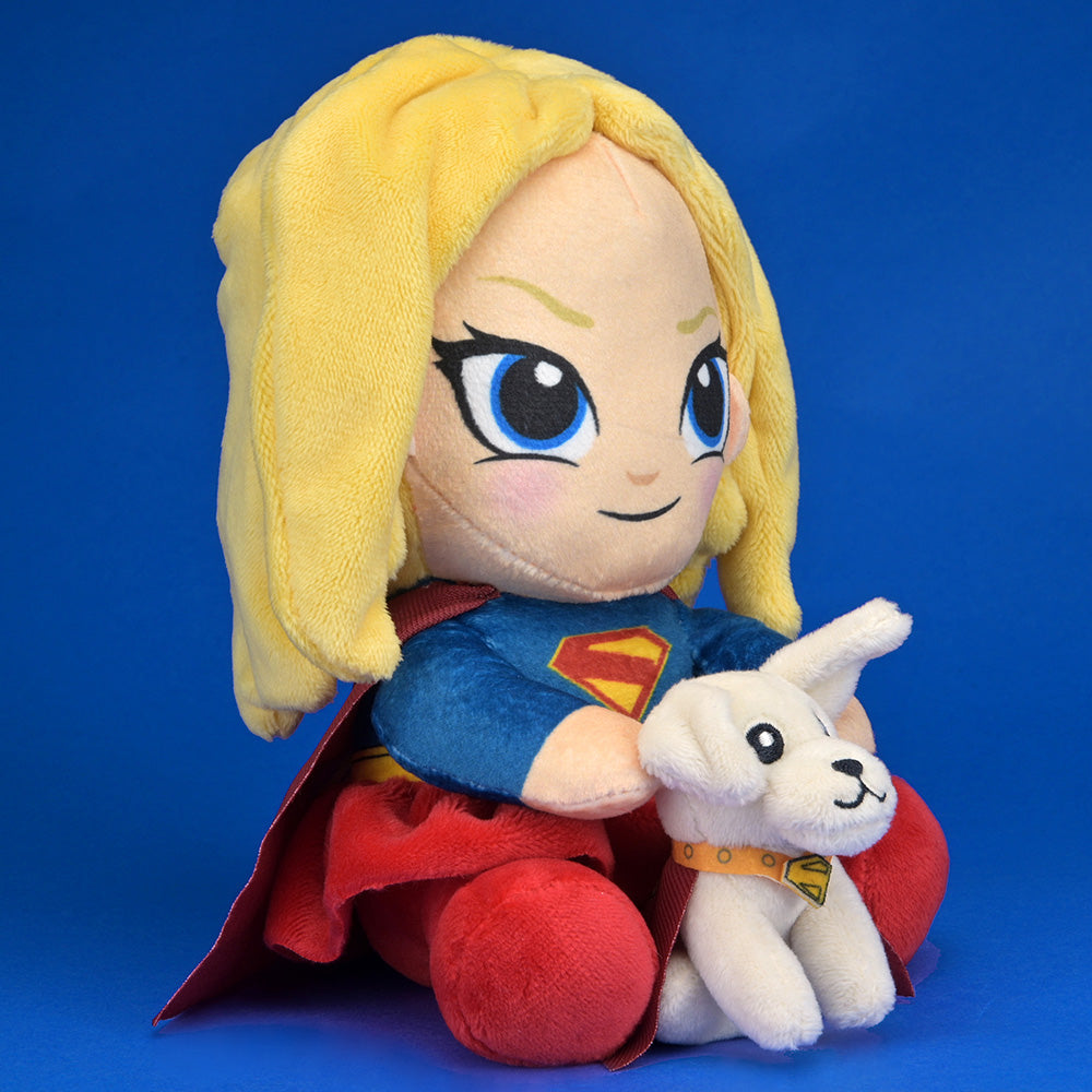 Supergirl plush toy with Krypto the dog from Supergirl brand, soft and cuddly, featuring vibrant superhero costume and friendly expression.