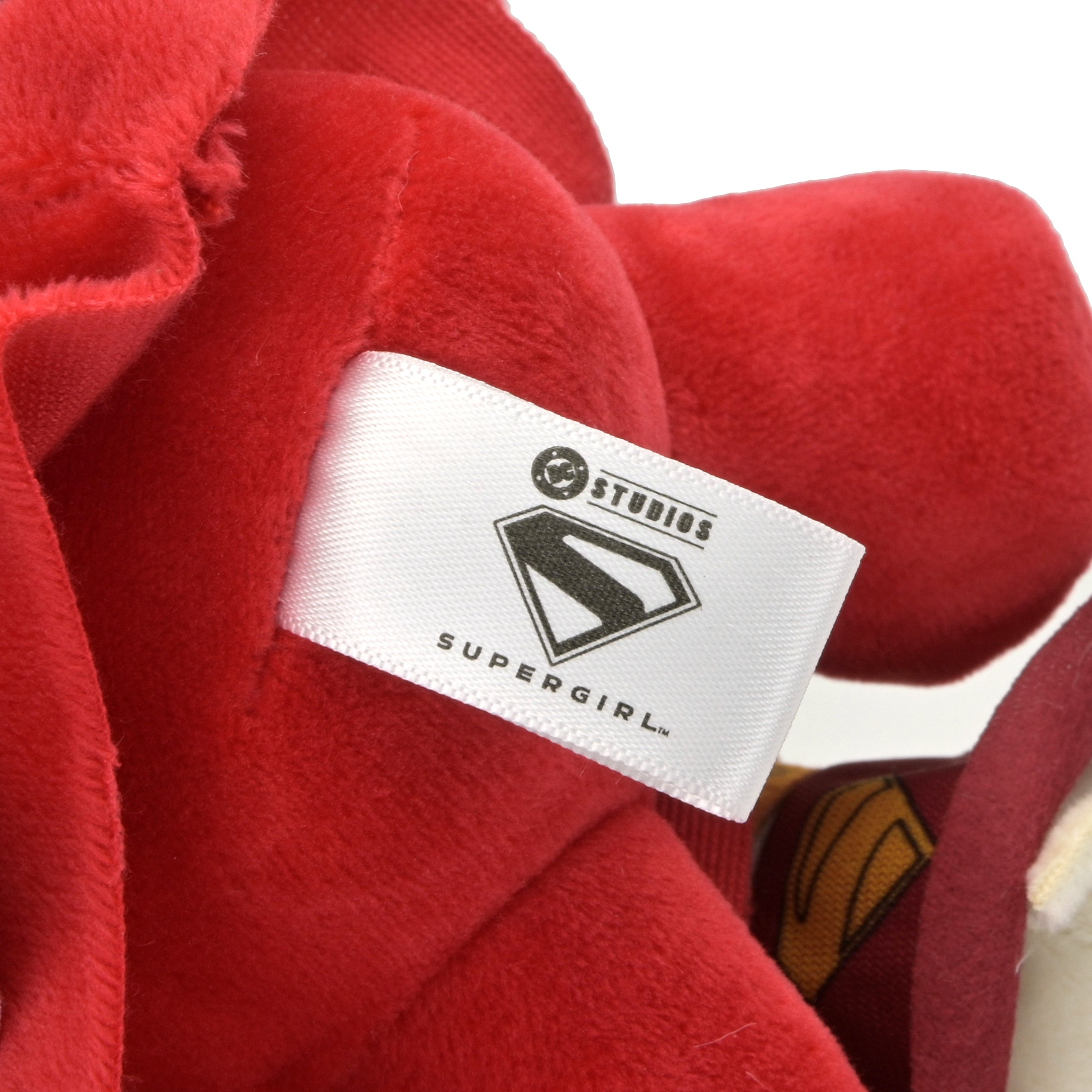 Supergirl plush toy with Krypto from Supergirl Phunny Plush collection, detailed fabric and vibrant colors, pre-order available.