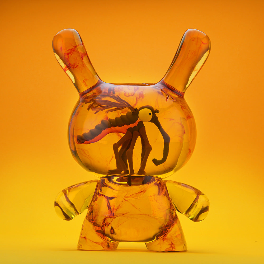 Amber Dunny 8-inch resin art figure by Kidrobot, showcasing a stylized Dunny design with intricate amber-colored details.