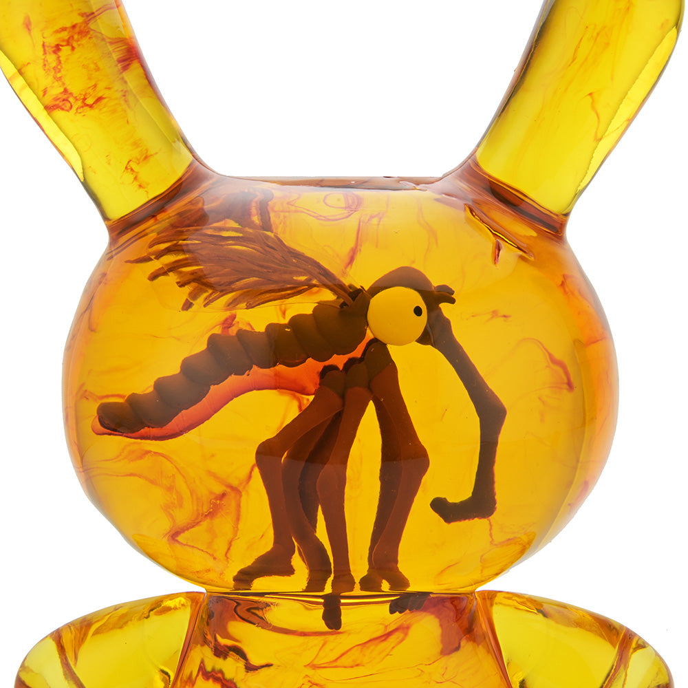 Pre-order Amber Dunny 8-inch resin art figure by Kidrobot, featuring a stylized collectible Dunny design with vibrant amber colors.