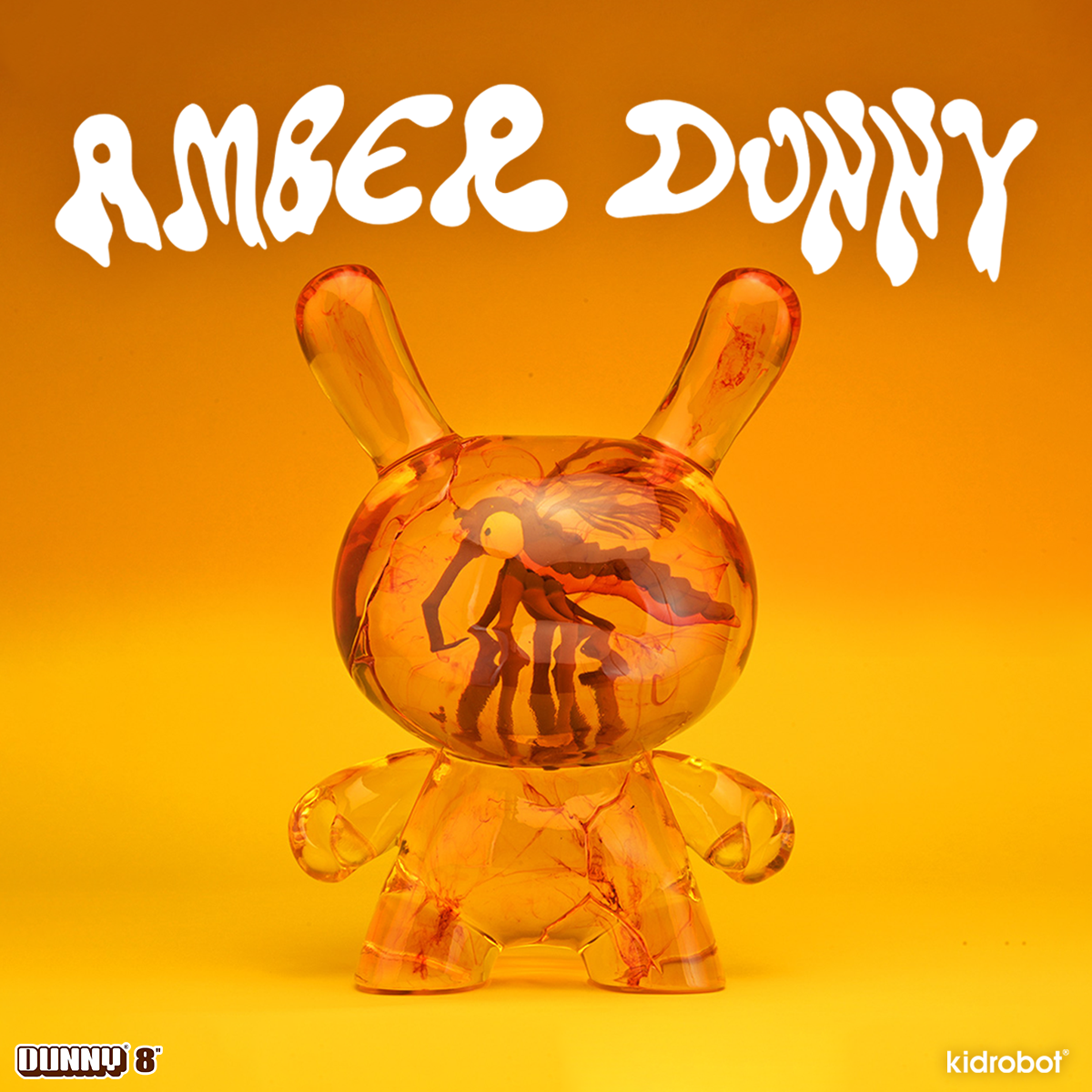 Amber Dunny 8-inch resin art figure by Kidrobot, showcasing its detailed amber-colored design and modern Dunny style.