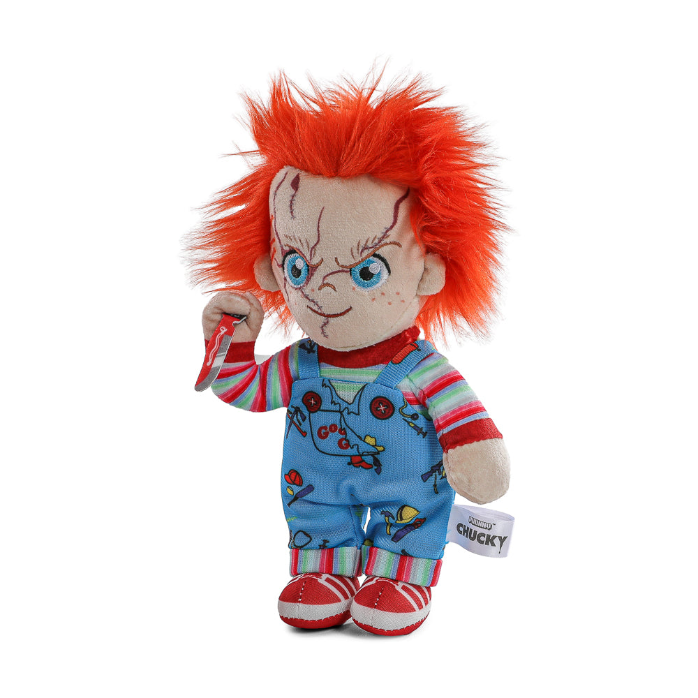 Bride of Chucky Evil Chucky and Tiffany plush toys by Chucky, standing in box, featuring detailed horror character designs.