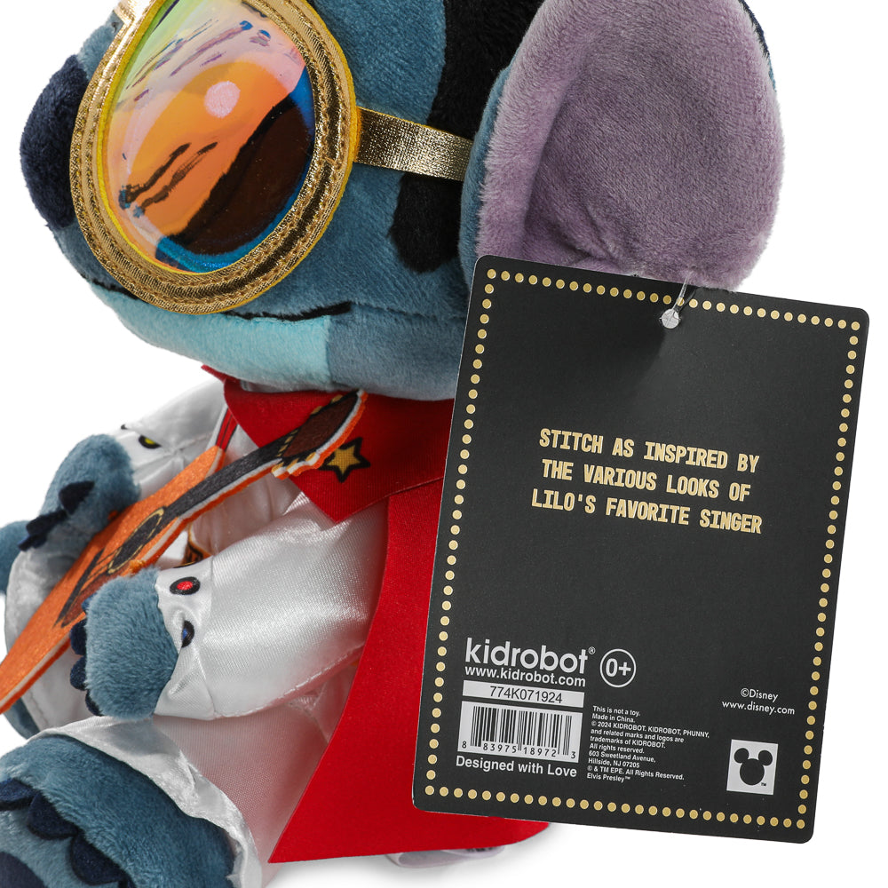 Disney Stitch plush in a white Elvis-inspired jumpsuit, featuring a soft, detailed plush toy with embroidered facial features.