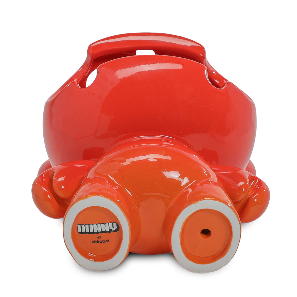 Kidrobot Fine Ash Dunny 5-inch ceramic ashtray figure in Sunset Orange edition, featuring a stylized Dunny design.
