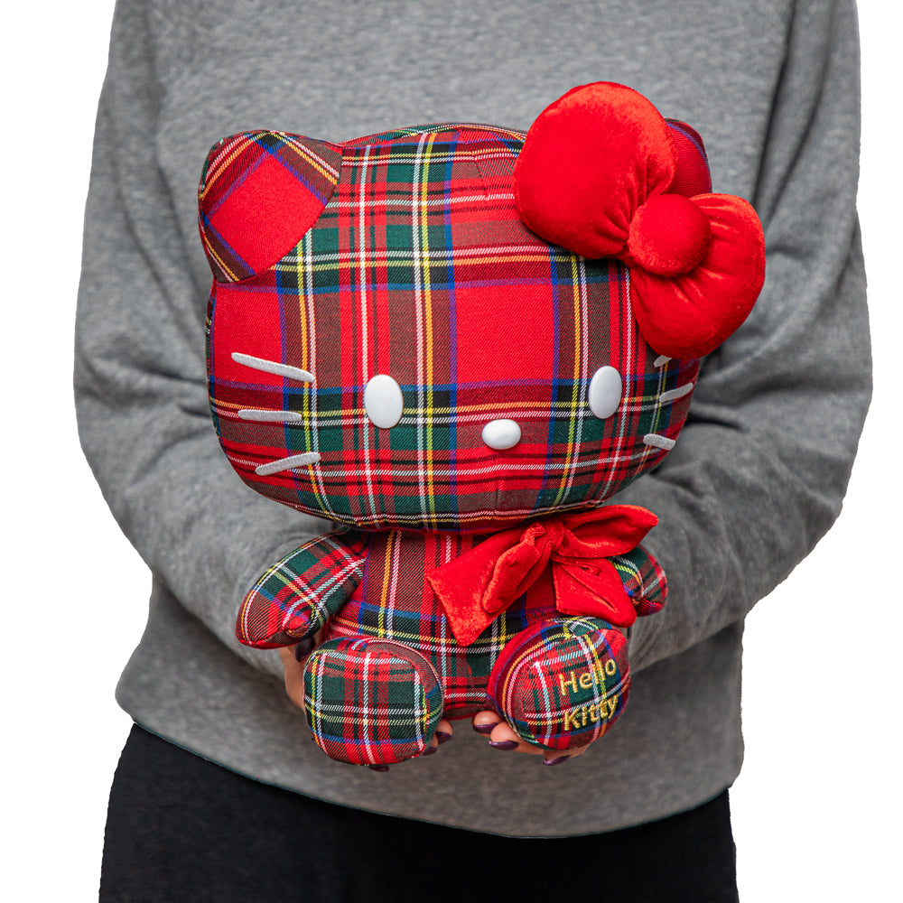Sanrio Hello Kitty plaid plush toy with soft fabric, featuring her signature bow and cute face, perfect for cuddling.