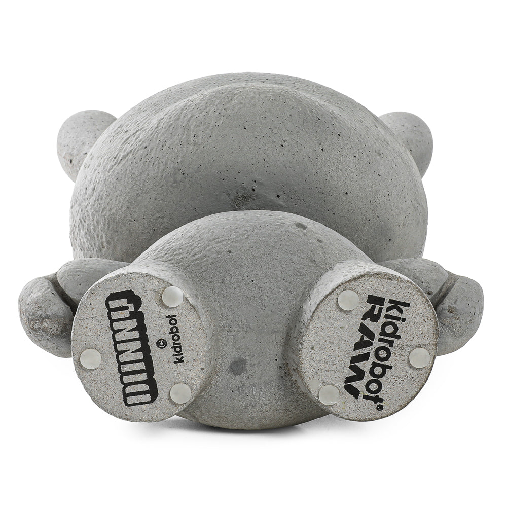 Kidrobot RAW 8-inch Concrete Dunny action figure, limited edition of 1000, showcasing a textured gray collectible toy.