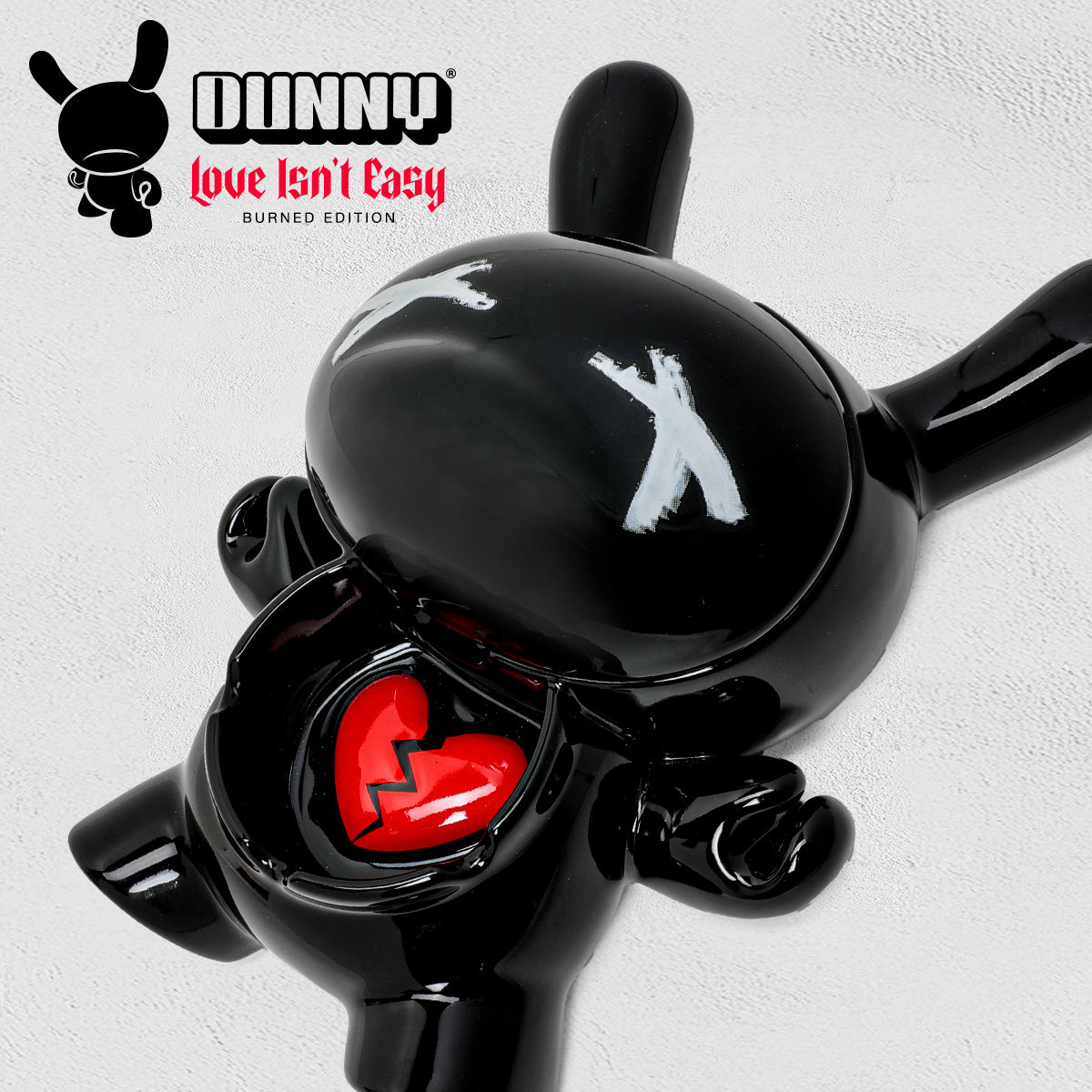 Kidrobot L.I.E. Dunny ceramic ashtray in burned edition, featuring a stylized Dunny character with detailed design and vivid colors.