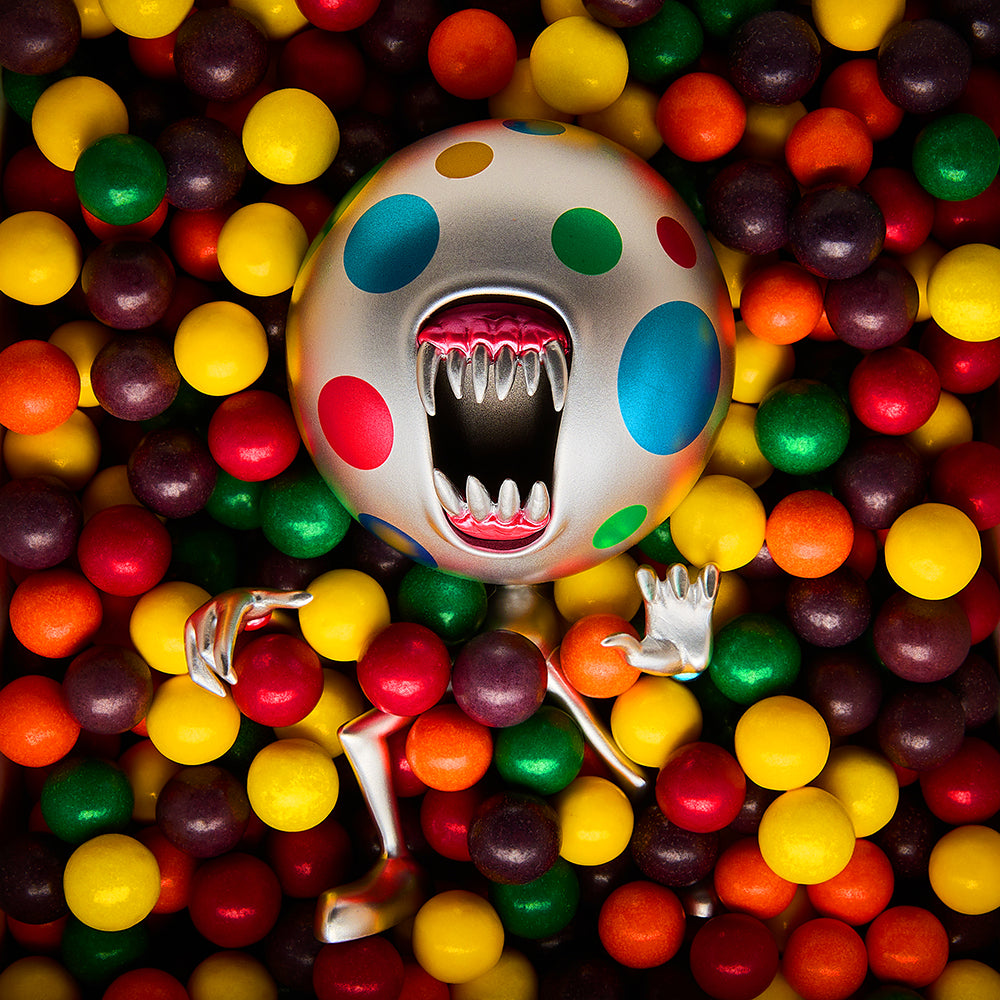 Metallic Breaker Candemon art figure by Alex Pardee, limited edition vinyl collectible with a shiny metallic finish.