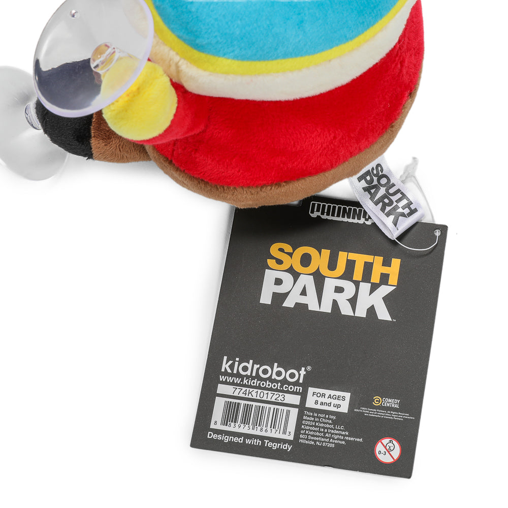 South Park Cartman 6-inch plush window clinger toy attached to a window with colorful background.