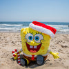SpongeBob SquarePants Santa plush toy with shake action, featuring SpongeBob in a Santa outfit hugging and smiling.