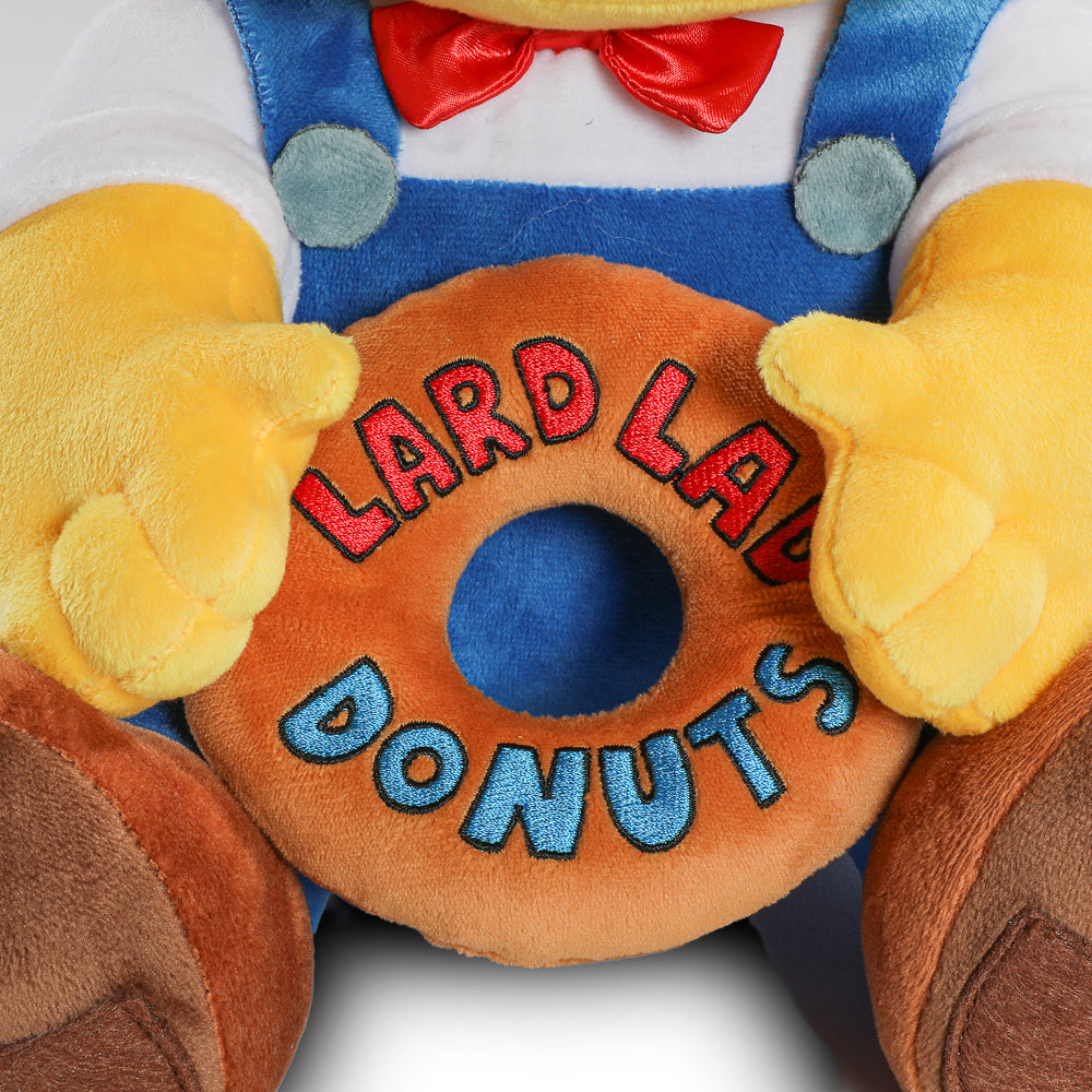 The Simpsons Lard Lad plush toy featuring the iconic character with a large donut, soft fabric, and detailed cartoon design.