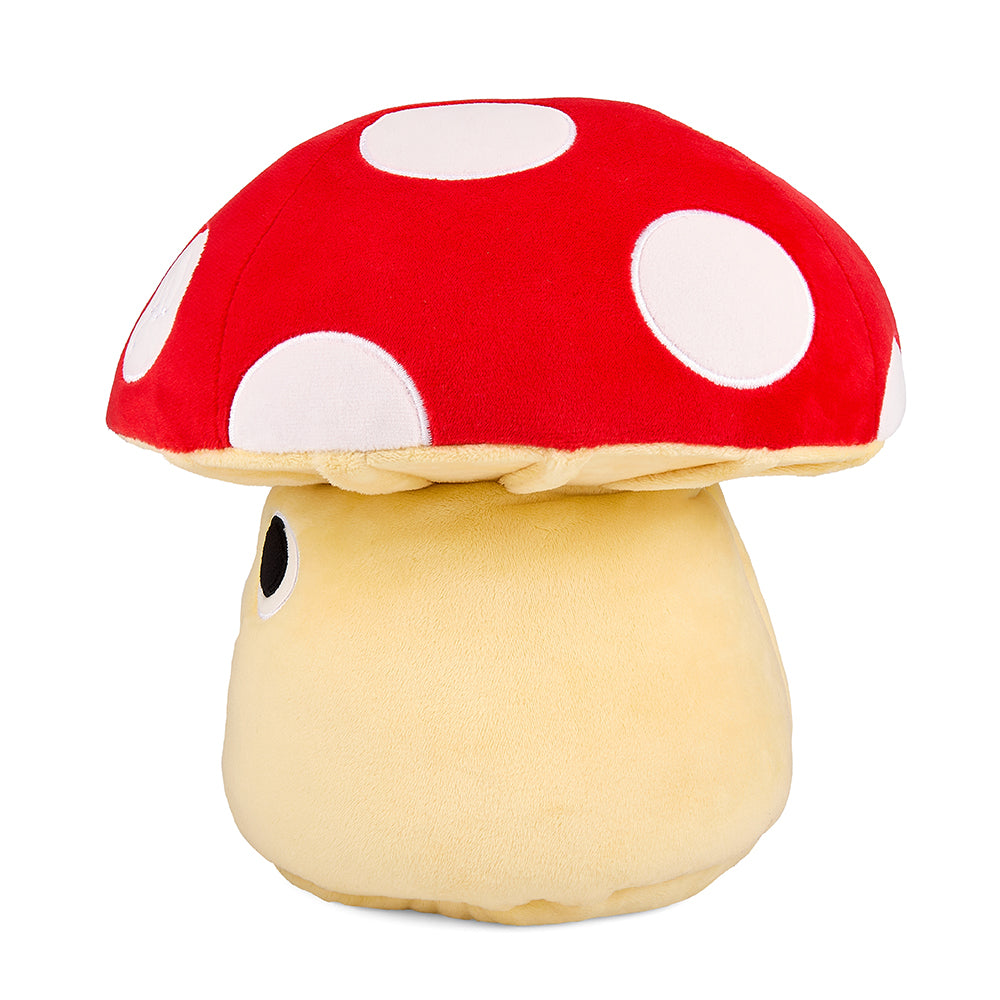 Interactive plush mushroom with frog gnomes by Kidrobot, featuring colorful, soft fabric and detailed gnome and mushroom designs.