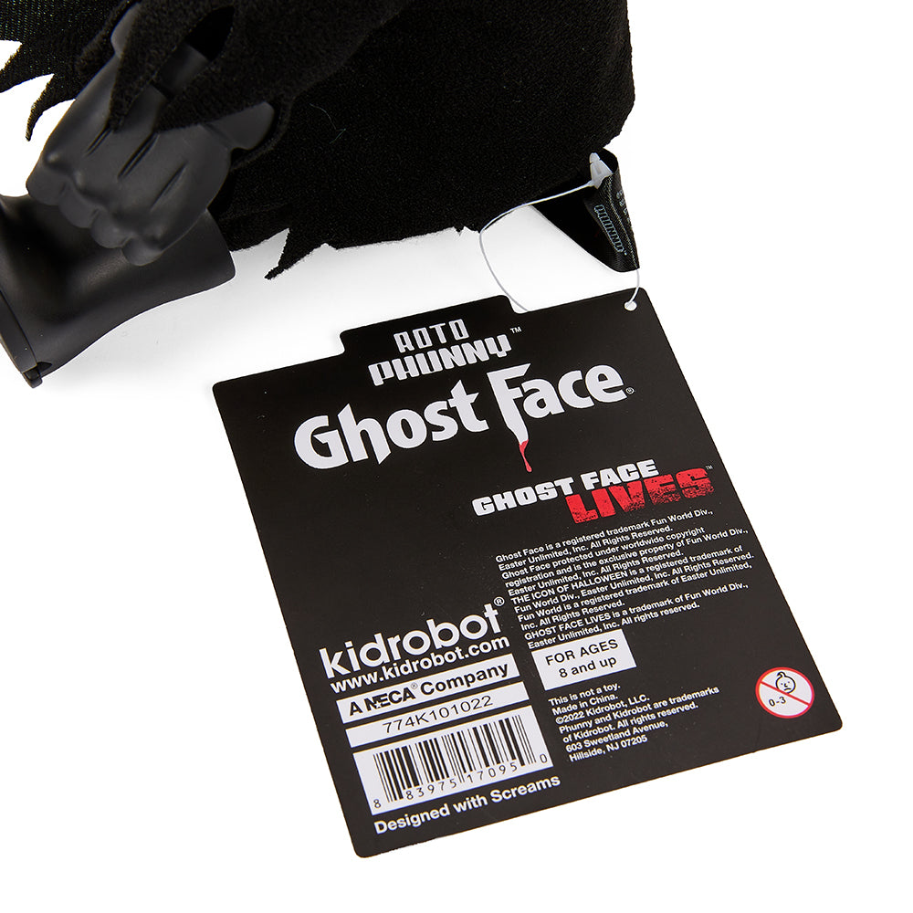 Ghost Face glow-in-the-dark Roto Phunny plush toy, 8-inch soft collectible with detailed facial features and spooky design.