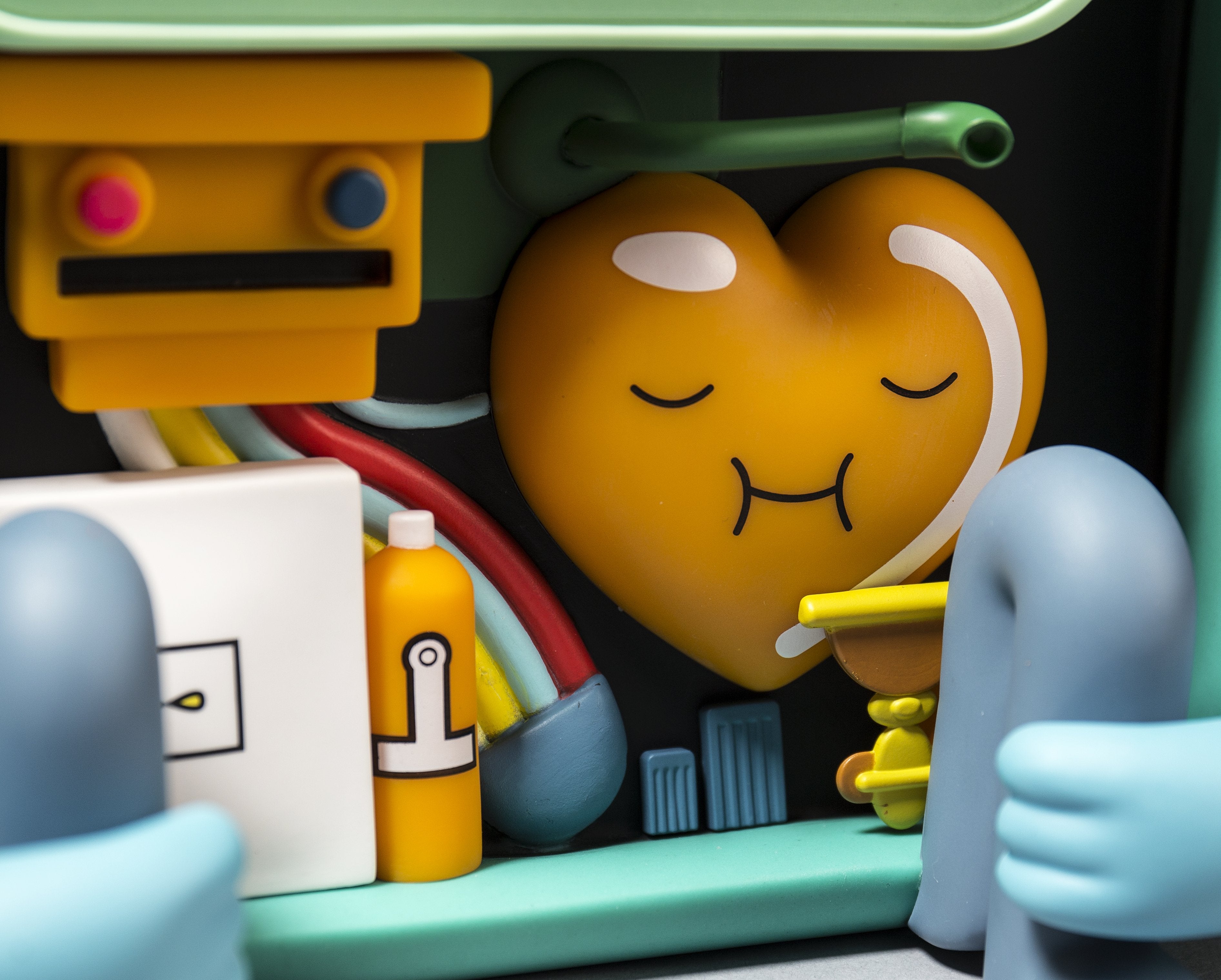 Adventure Time BMO art vinyl figure by Kidrobot, detailed collectible toy from the popular animated series.
