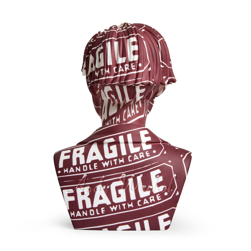 Andy Warhol 12-inch bust vinyl art sculpture, limited fragile edition, showcasing Warhol's iconic pop art style and vibrant colors.