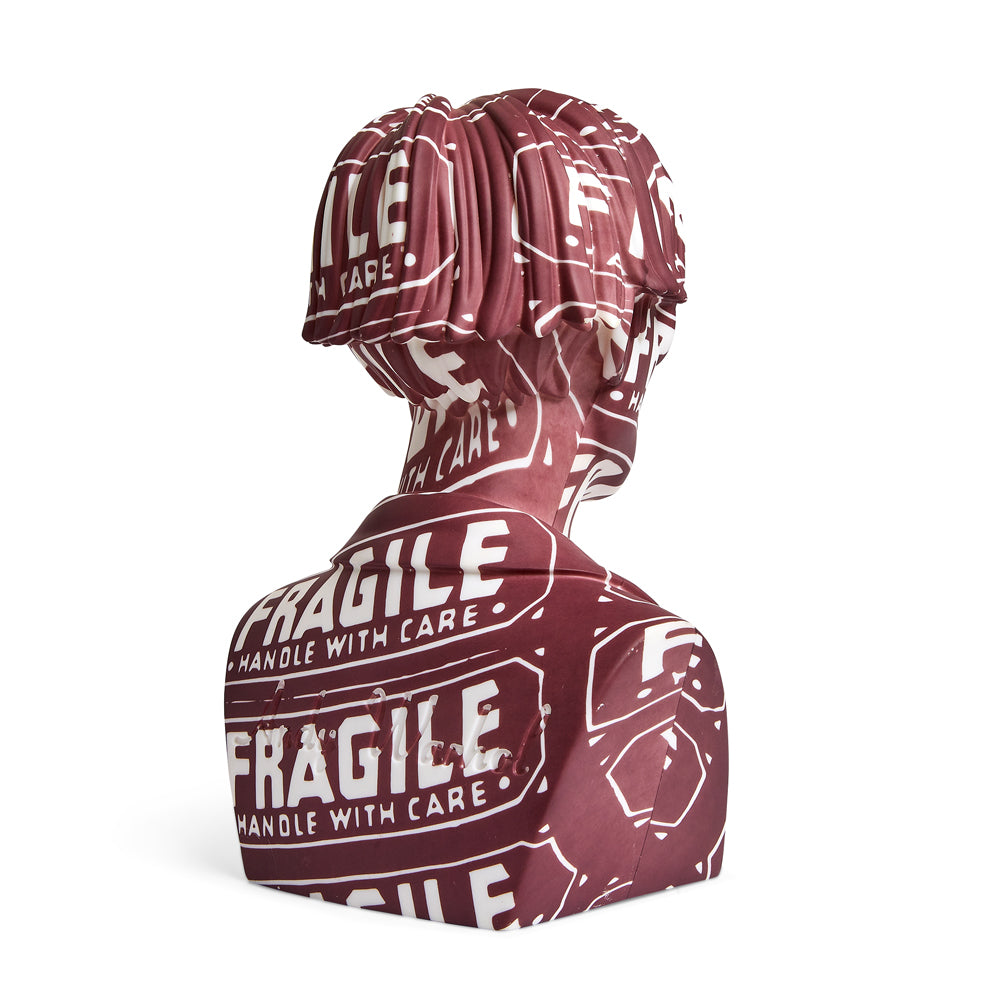 Andy Warhol 12-inch vinyl art sculpture bust, limited fragile edition, showcasing distinctive pop art style and vibrant colors.