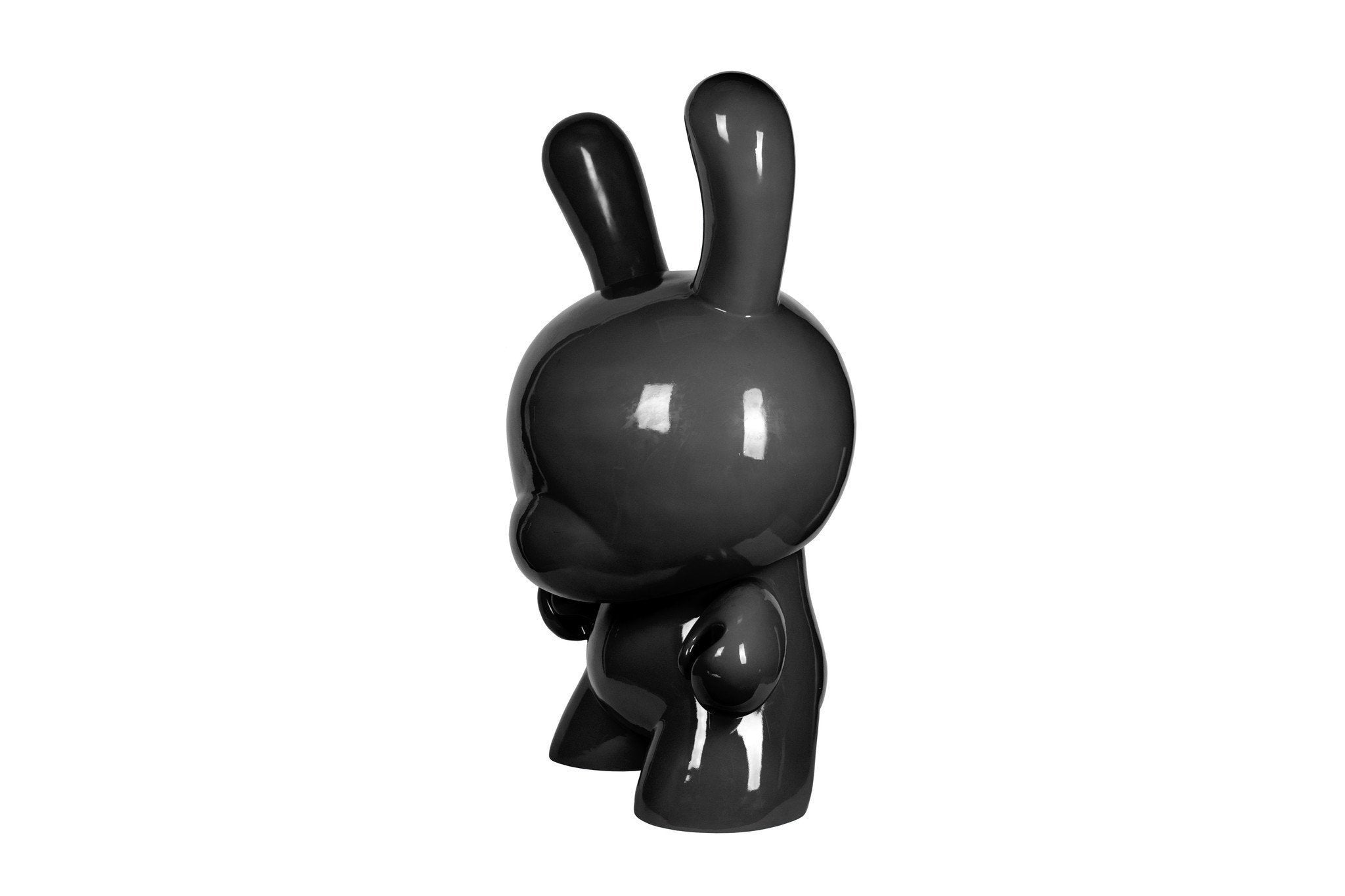 Red 4-foot Art Giant Dunny sculpture by Kidrobot featuring bold, stylized art design, standing upright with detailed surface textures.