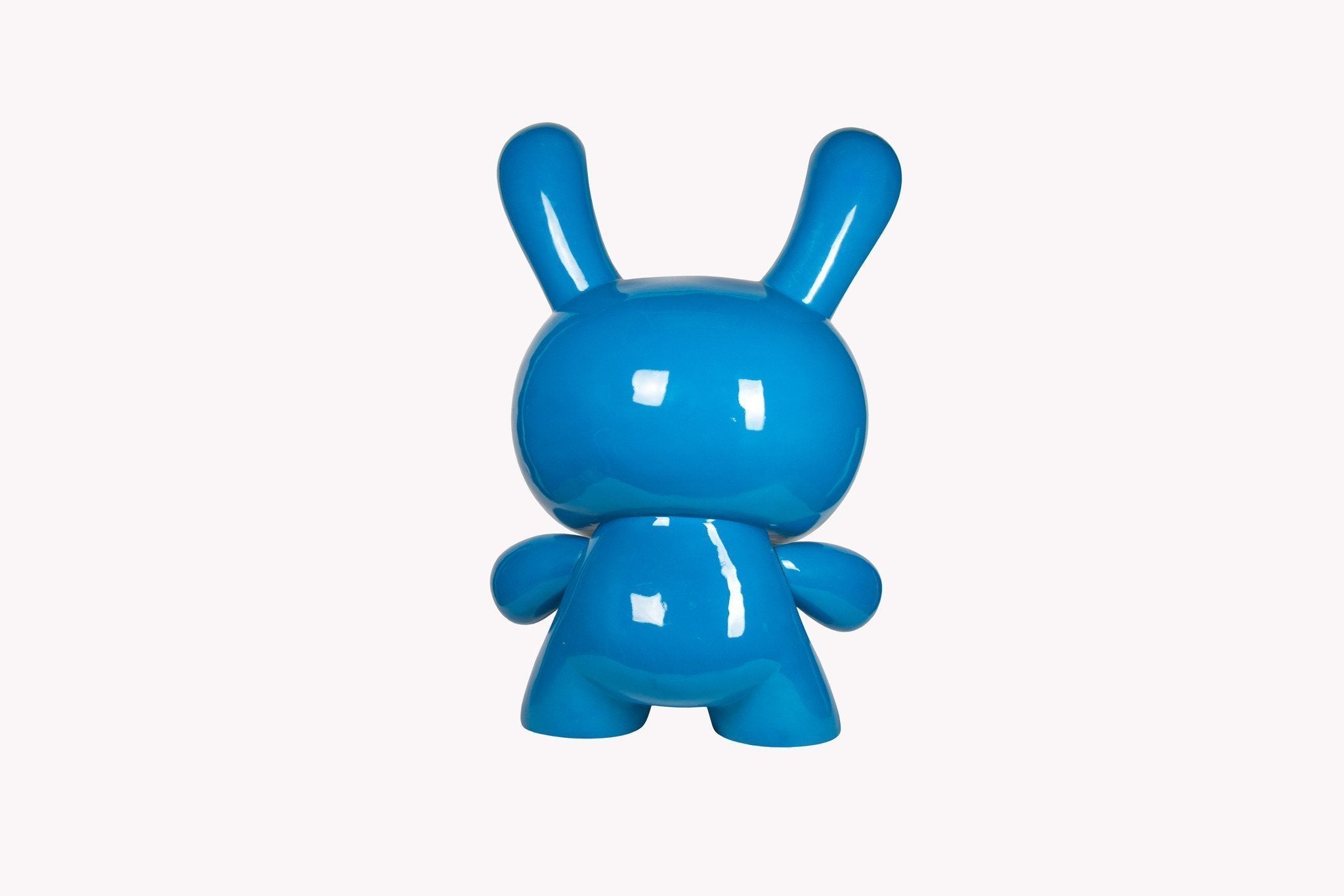 Large red Kidrobot Art Giant Dunny sculpture, 4-foot tall, featuring bold, stylized design with detailed painted surface.