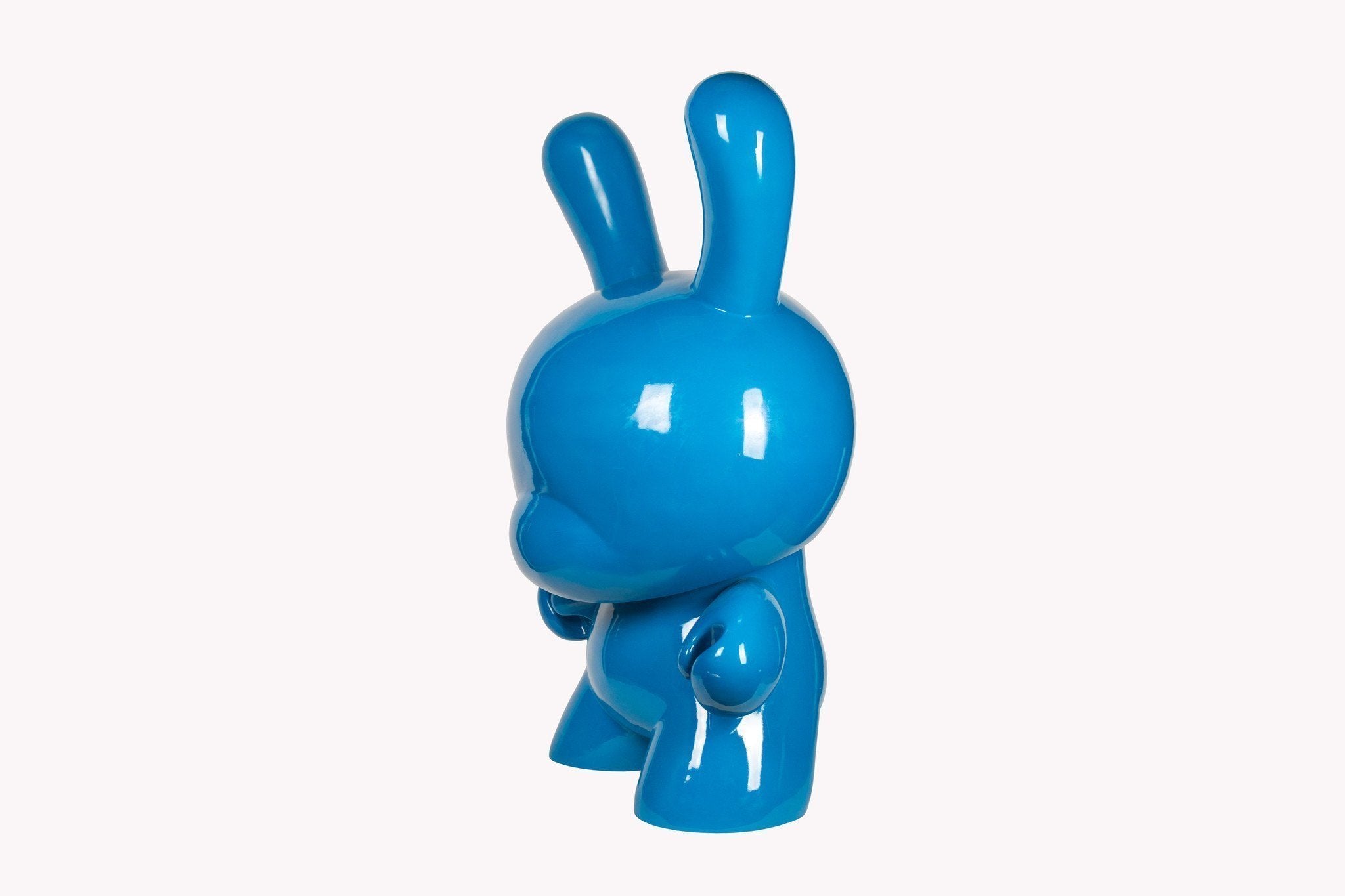 Red 4-foot Art Giant Dunny sculpture by Kidrobot featuring bold, stylized urban art design on a large vinyl figure.