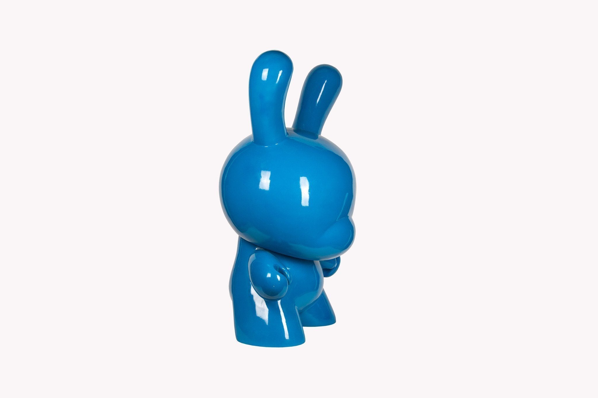 Red 4-foot Dunny art sculpture by Kidrobot, featuring bold, stylized design and vibrant color, displayed as a large collectible art piece.