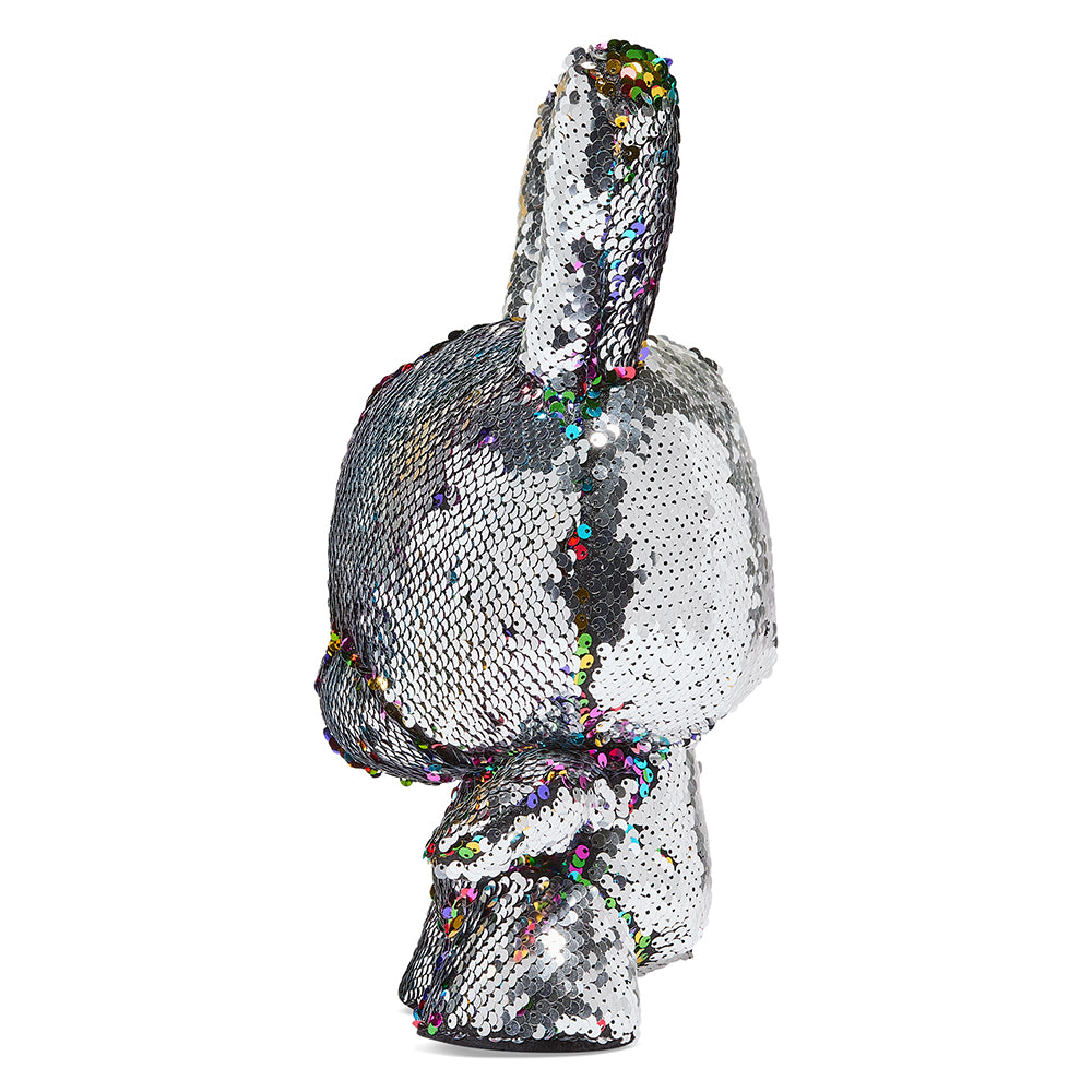 Kidrobot Flippin Rainbows 13-inch plush Dunny with colorful rainbow design, soft fabric, and detailed stitching.