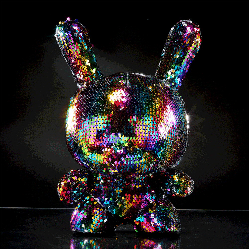 Kidrobot Flippin Rainbows 13-inch plush Dunny with colorful rainbow design and soft fabric texture.