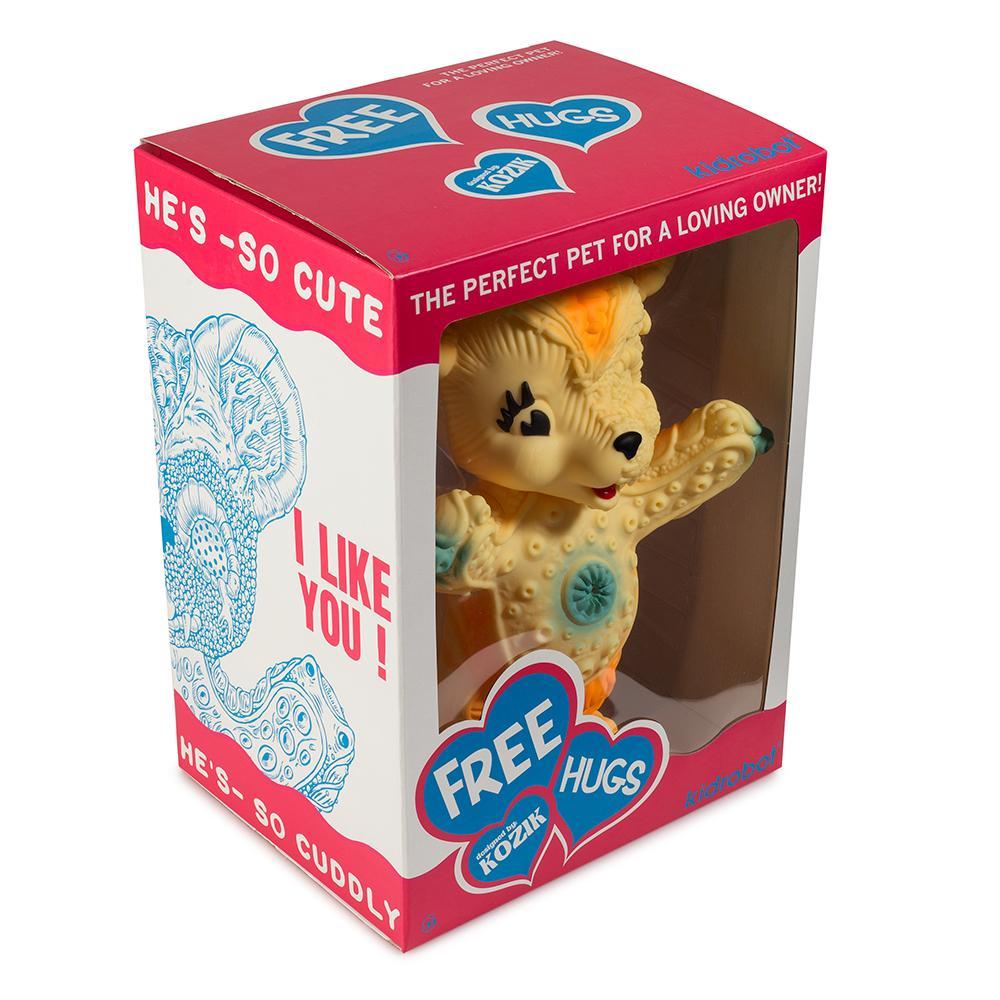 Orange edition Free Hugs Bear art figure by Frank Kozik, limited to 500, showcasing a vinyl collectible with vibrant colors and detailed design.