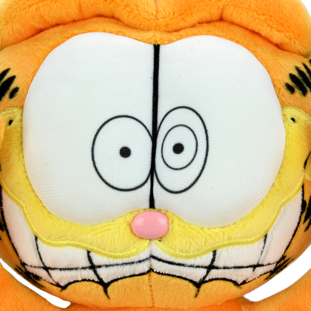 Garfield 8-inch plush window clinger by Kidrobot featuring a scared expression, with suction cups for hanging on windows.