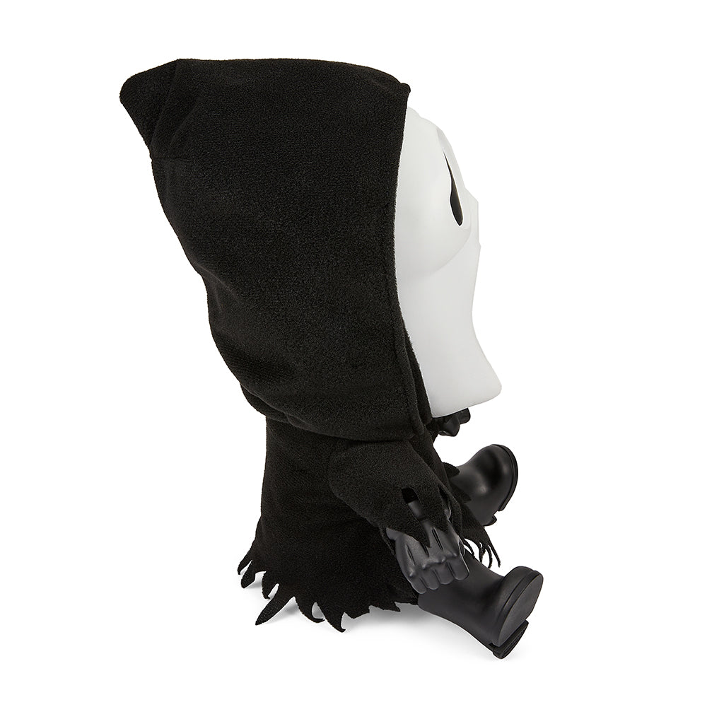 Ghost Face Glow-in-the-Dark Roto Phunny plush toy, soft and detailed ghost face character with glowing features in low light.