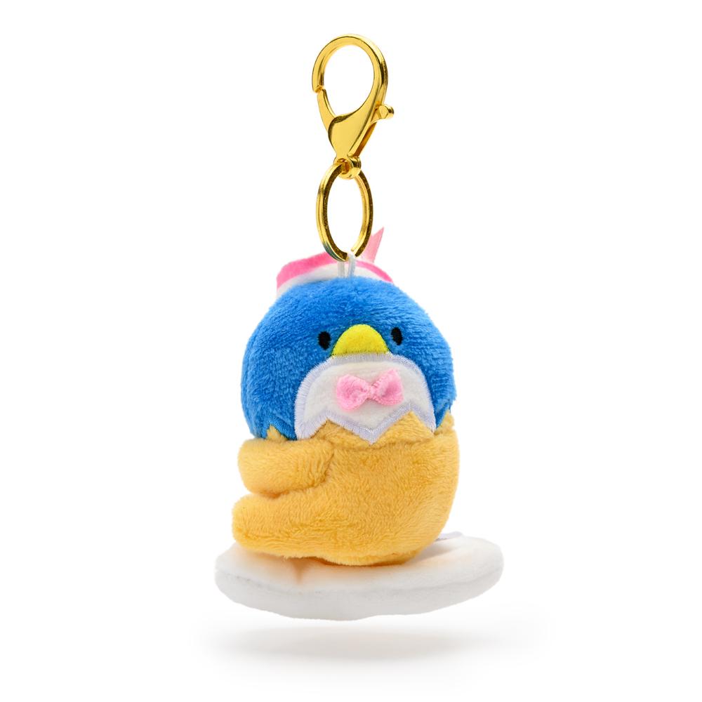 Gudetama the Lazy Egg plush charm keychain by Kidrobot x Sanrio, featuring a soft, adorable egg character with a cute expression.
