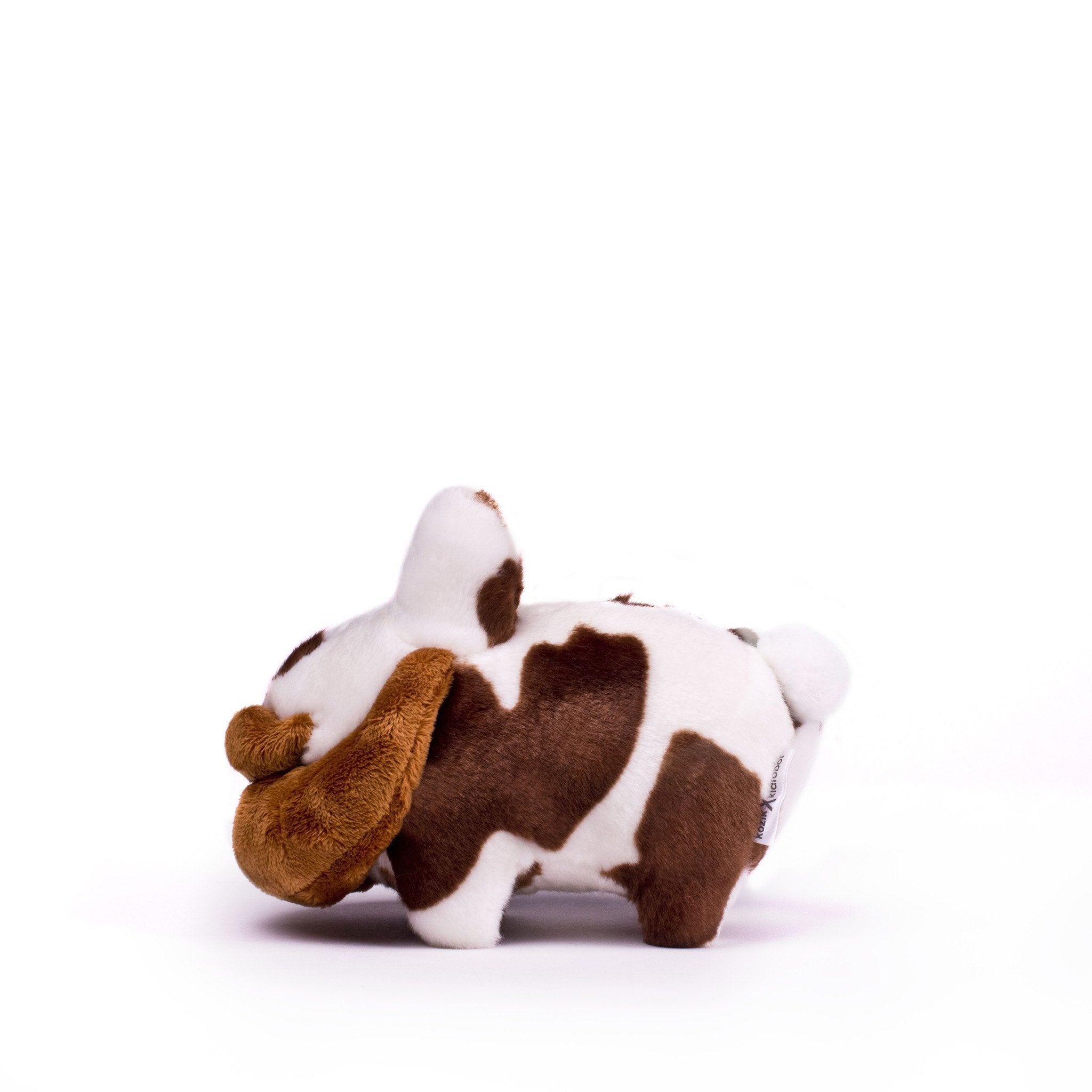 Brown Happy Labbit Cow plush stuffed animal by Frank Kozik, 7-inch soft and cuddly plush toy for collectors and fans.