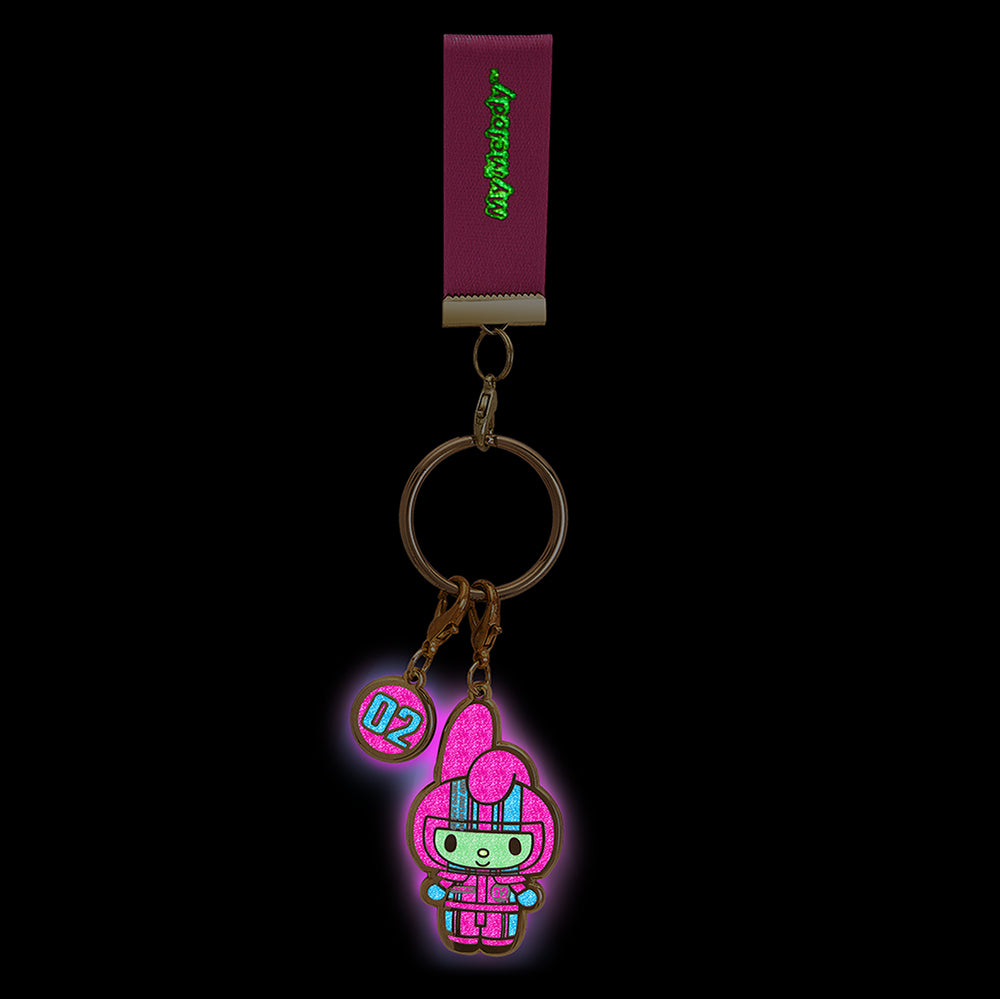 Hello Kitty and Friends Tokyo Speed enamel keychain by Sanrio featuring colorful character designs and detailed metal accents.