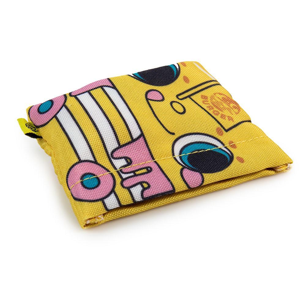 Hello Sanrio Micro Vehicle art figure by Kidrobot in a sealed blind bag, featuring a colorful vinyl design.