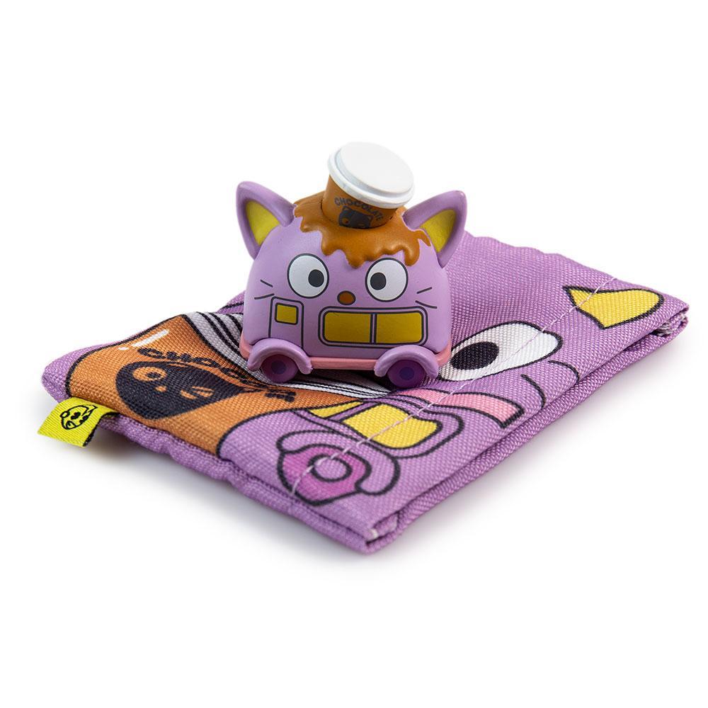 Sanrio Hello Kitty micro vehicle art figure by Kidrobot in a sealed blind bag, vinyl collectible toy.
