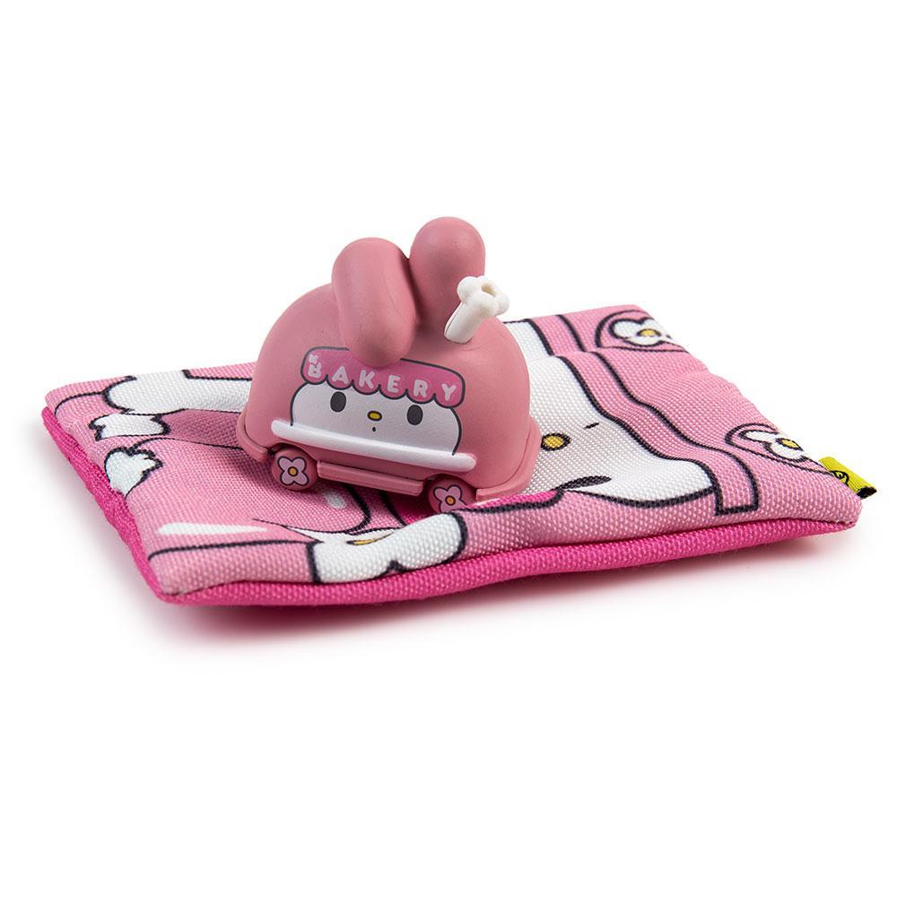 Sanrio Hello Micro Vehicle art figure by Kidrobot in a sealed blind bag, featuring colorful vinyl character design.