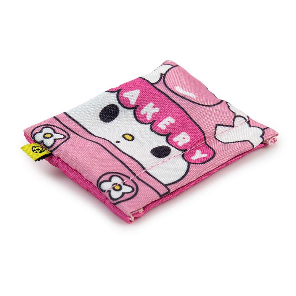 Sanrio Hello Kitty micro vehicle art figure from Kidrobot blind bag series, vinyl collectible with detailed design.