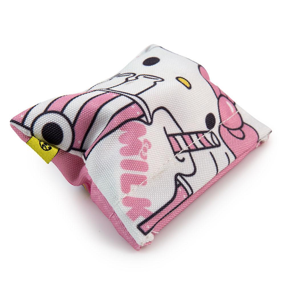 Sanrio Hello Kitty micro vehicle art figure by Kidrobot, vinyl blind bag packaging, collectible toy, detailed and colorful design.