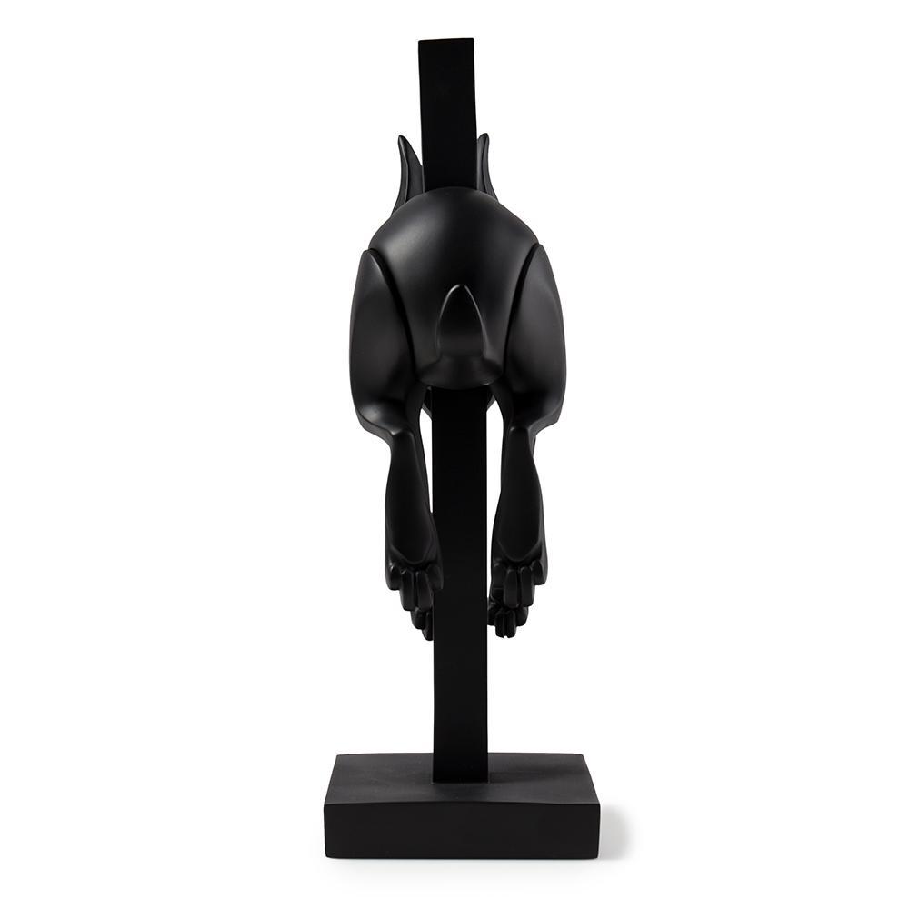 Matte black resin art figure titled Jumper by Colus Havenga with smooth, modern design and detailed craftsmanship.