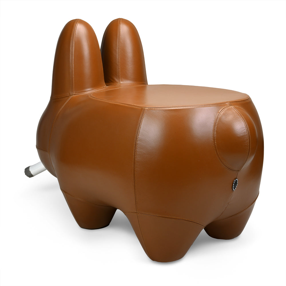 Kidrobot Art Giant Leather Smorkin' Labbit Stool in brown, featuring a detailed leather design and playful Labbit character.