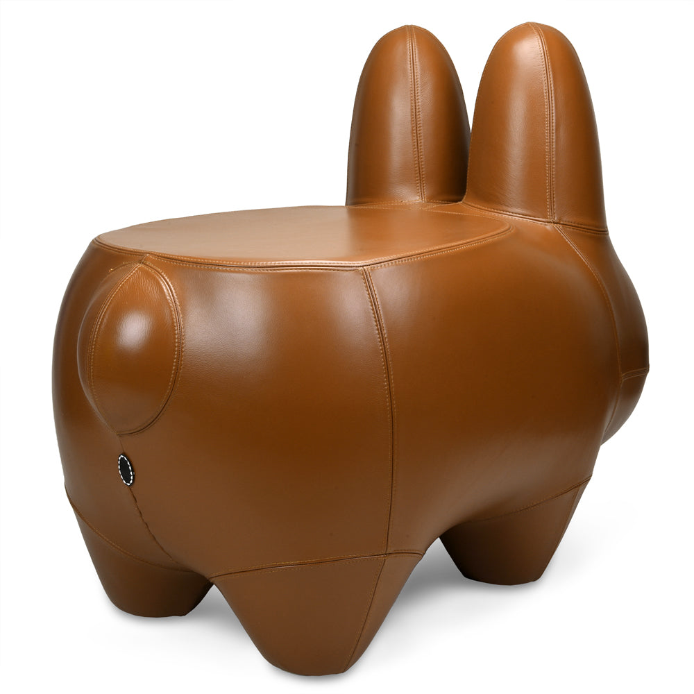 Kidrobot Art Giant Leather Smorkin' Labbit Stool in brown, showcasing the playful, oversized Labbit character with textured leather details.
