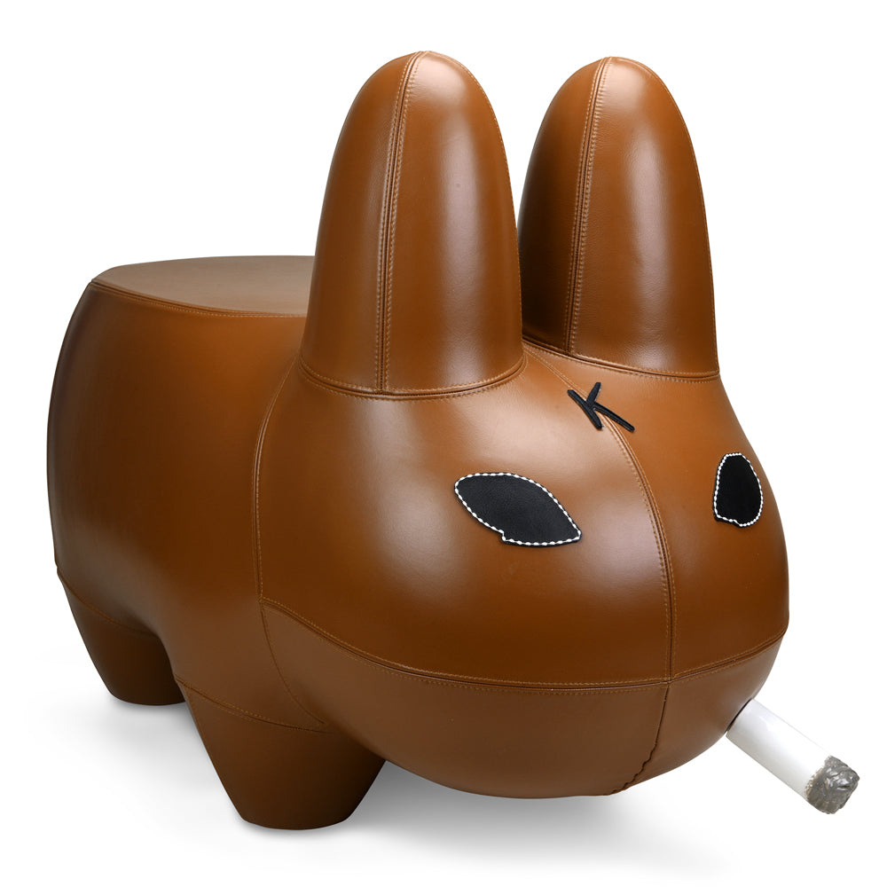Kidrobot Art Giant Leather Smorkin' Labbit Stool in brown leather, featuring the iconic Labbit design and detailed craftsmanship.