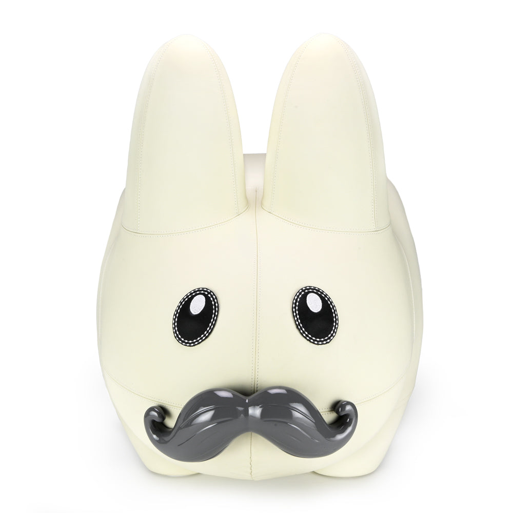 Kidrobot Leather Happy Labbit Stool in Virgin White edition, featuring fiberglass and leather construction, designed by Frank Kozik.