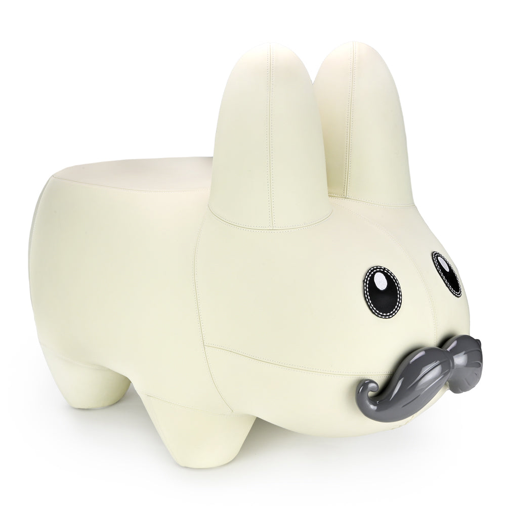 Kidrobot Leather Happy Labbit Stool by Frank Kozik in Virgin White leather with fiberglass base, showcasing its playful Labbit design.