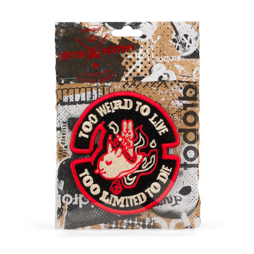 Kidrobot Stitch & Destroy patch featuring "Too Weird To Live, Too Limited To Die" design on fabric background
