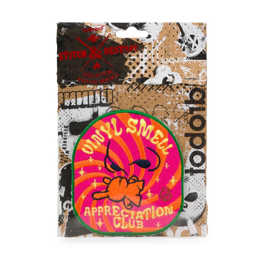 Kidrobot Stitch & Destroy vinyl patch from the Smell Appreciation Club featuring colorful, cartoon-style Stitch design on fabric patch